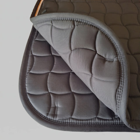 Dressage saddle pad 24/7 in black with copper and gray cord