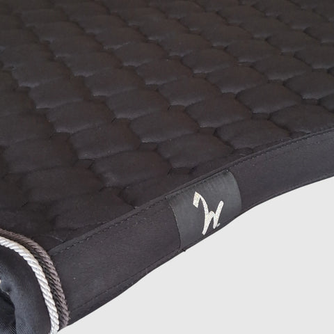 Gigolo saddle pad in black with silver/black/anthracite cord